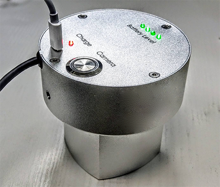 This portable and light vein finding system can be charged while nurse is using it for vein access